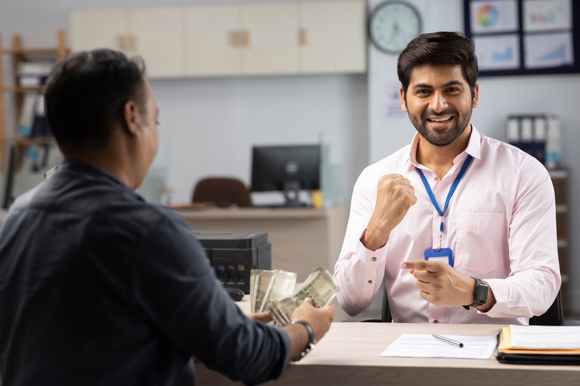 Customer with bank manager in office stock photo